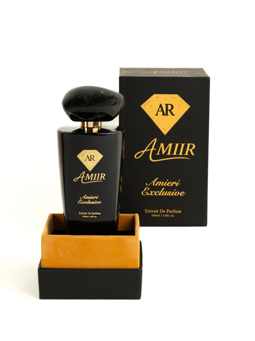 Amiir Scents Amieri Exclusive extrait de parfum in black bottle with golden details and matching luxury packaging box on white background