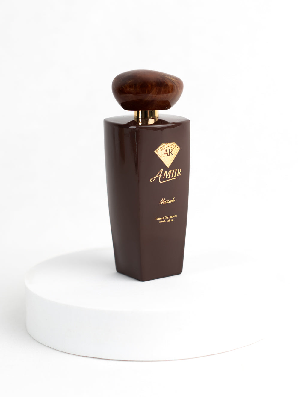 Amiir Scents Gazab extrait de parfum in brown bottle with golden accents on white background