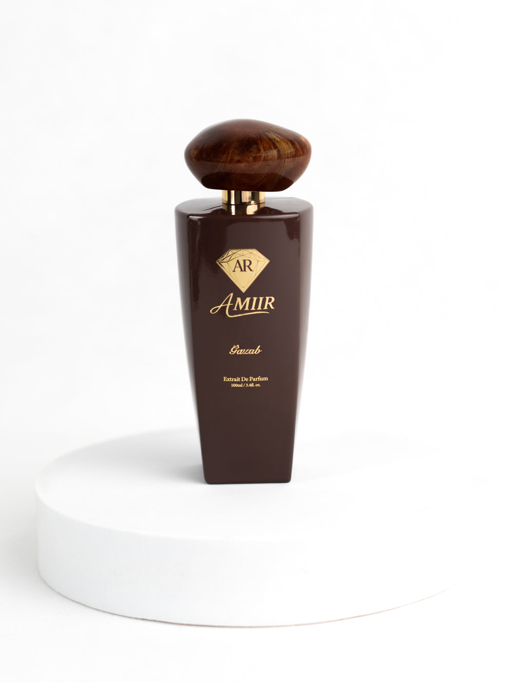 Amiir Scents Gazab extrait de parfum in brown bottle with golden accents on white background