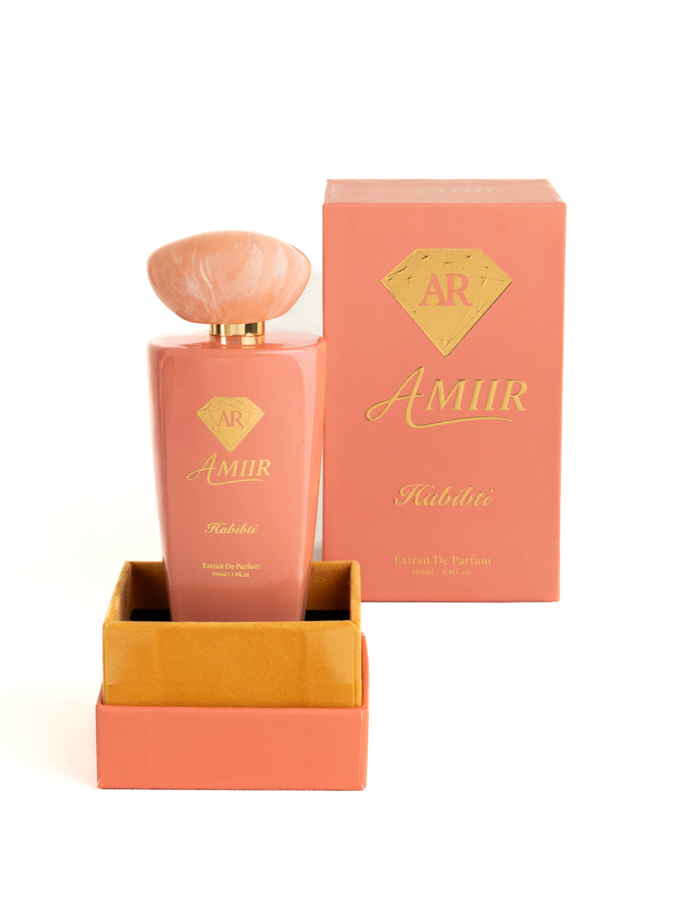 Amiir Scents Habibti extrait de parfum in coral-colored bottle with matching luxury packaging box on white background