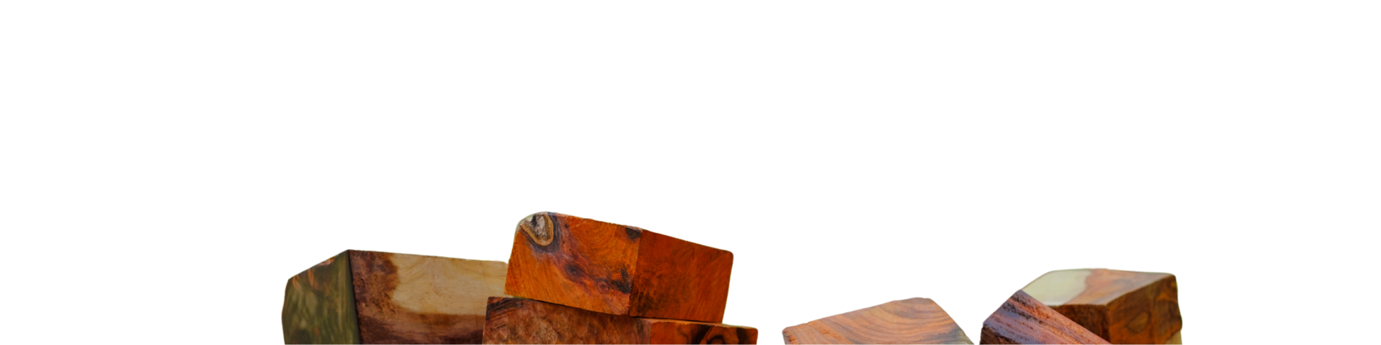 Stack of wooden boxes with a glossy finish on a white background representing the Top notes.